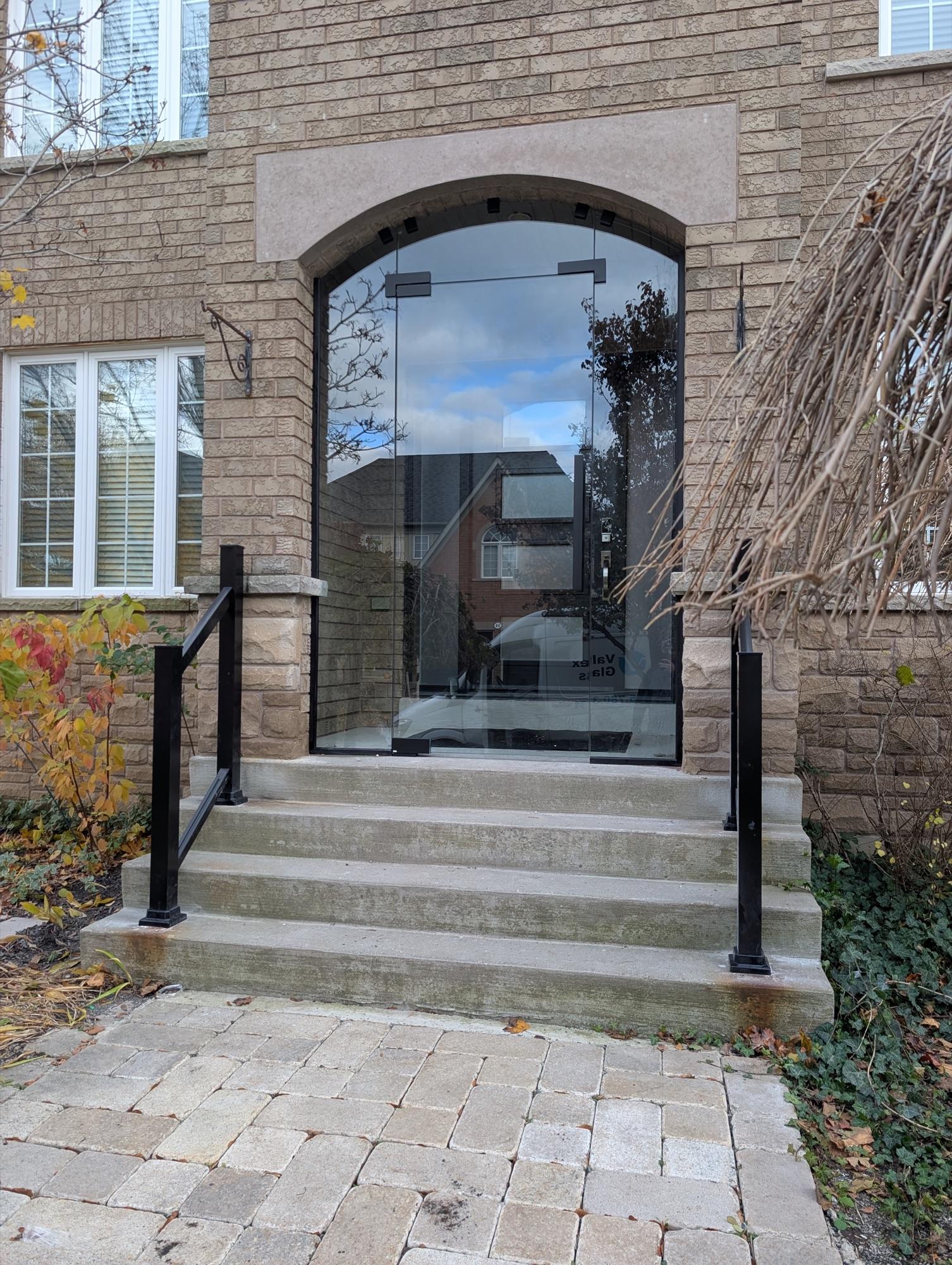 Stainless steel glass clamps and mounting for porch enclosure